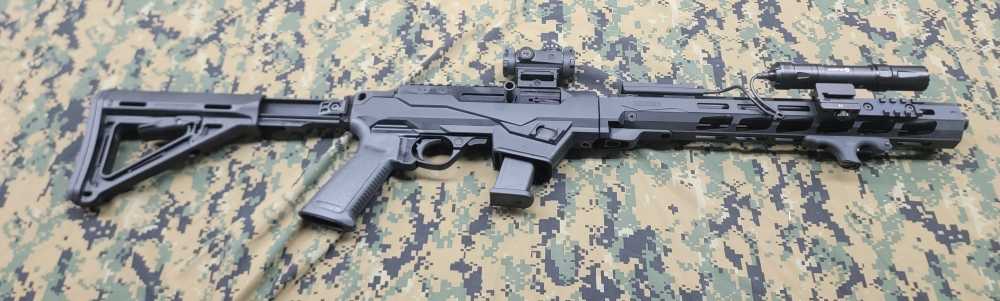 Ruger PC Carbine with collapsible stock, glock mag, and accessories.-img-7