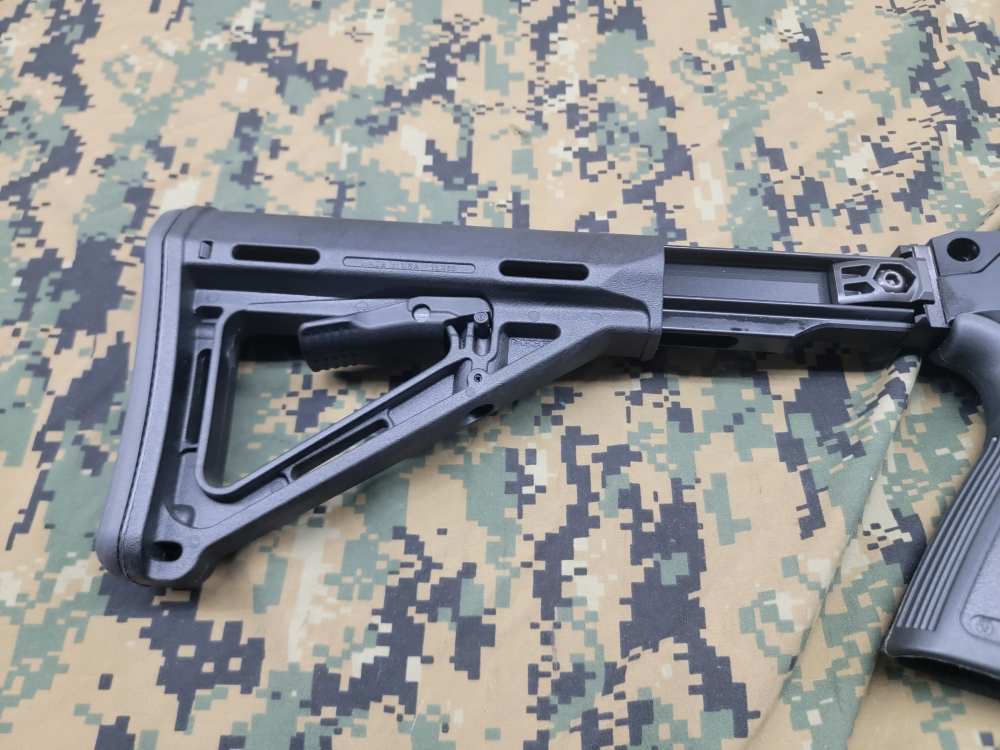 Ruger PC Carbine with collapsible stock, glock mag, and accessories.-img-8