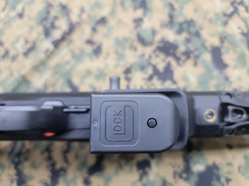 Ruger PC Carbine with collapsible stock, glock mag, and accessories.-img-25