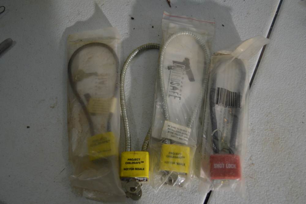 Unknown gun/trigger lock, factory, new, Qty 4 -img-0