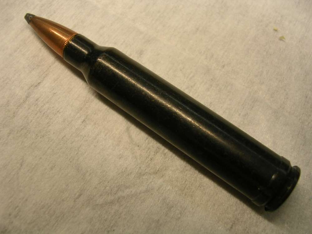 New, old stock 300 Win Mag action proving dummy-img-0
