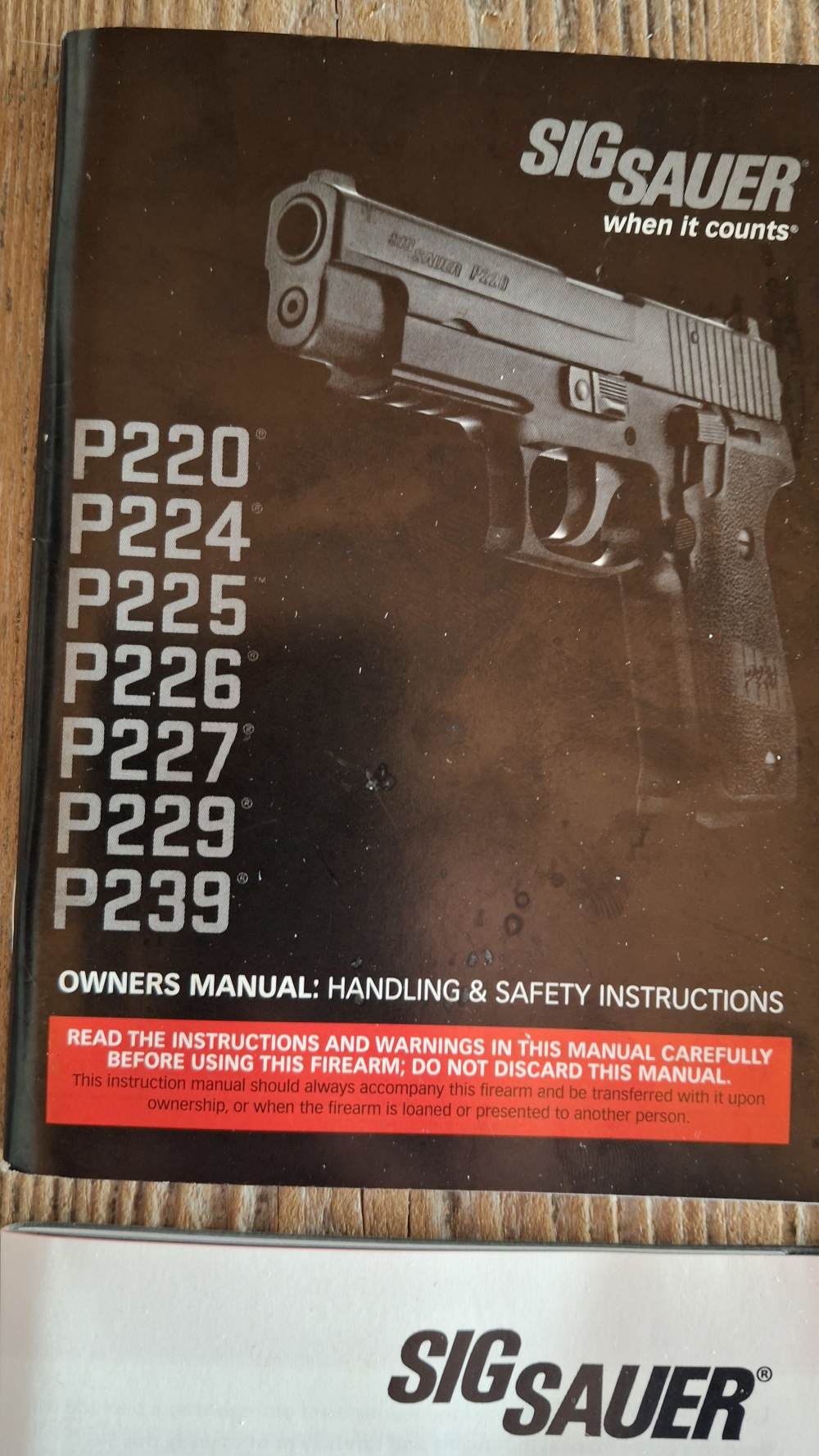 8 Piece Lot of Sig Sauer Pistol Manuals -img-1