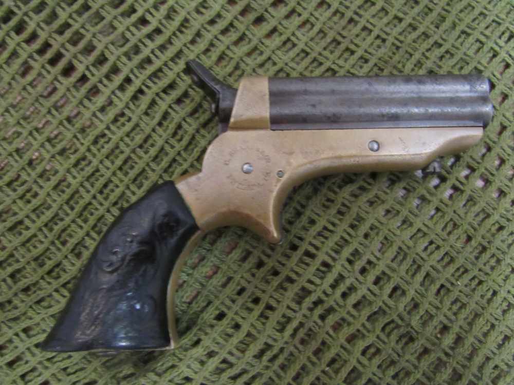 C. Sharps Model 1A Pepperbox 22 Pistol SN: 7436. -img-0