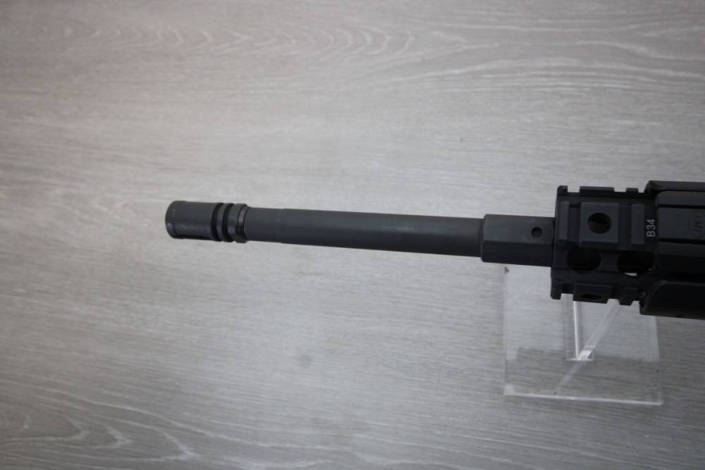 Lewis Machine and Tool (LMT) Model Defender in 5.56 NATO with 16" Barrel. -img-19