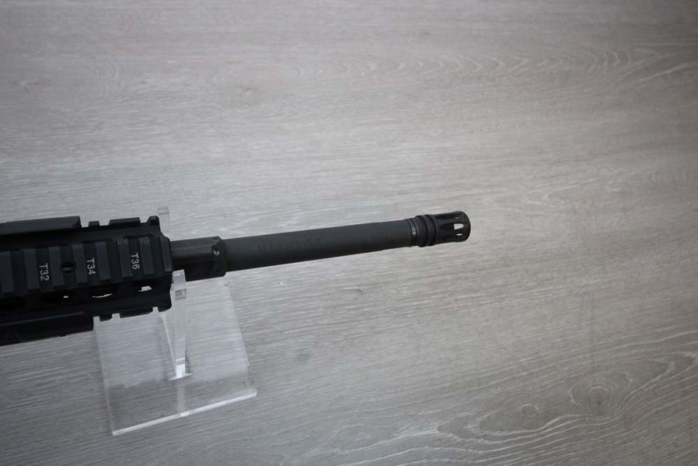 Lewis Machine and Tool (LMT) Model Defender in 5.56 NATO with 16" Barrel. -img-15