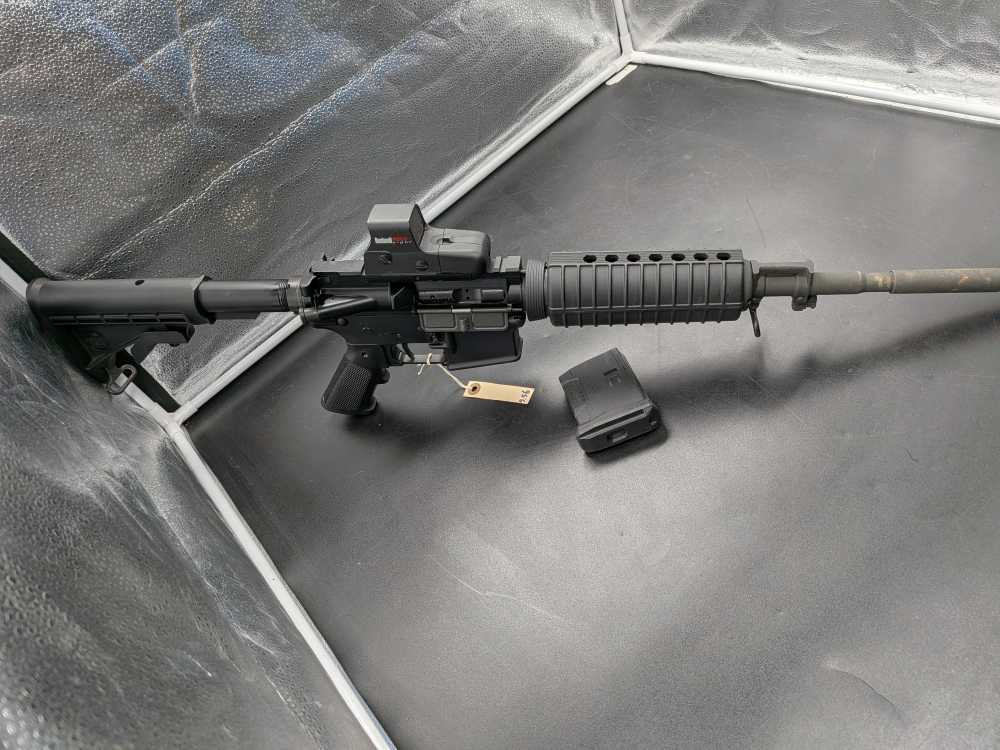 Bushmaster XM-15 5.56 NATO tactical rifle with Bushnell holo sight-img-3