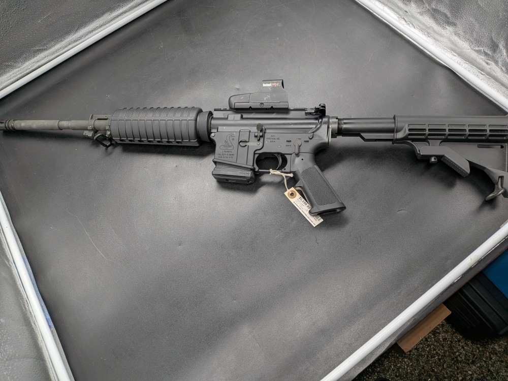 Bushmaster XM-15 5.56 NATO tactical rifle with Bushnell holo sight-img-0