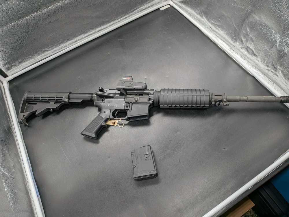 Bushmaster XM-15 5.56 NATO tactical rifle with Bushnell holo sight-img-2