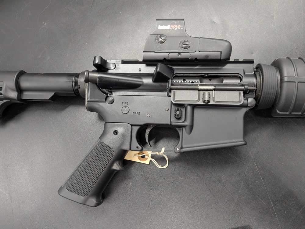 Bushmaster XM-15 5.56 NATO tactical rifle with Bushnell holo sight-img-7