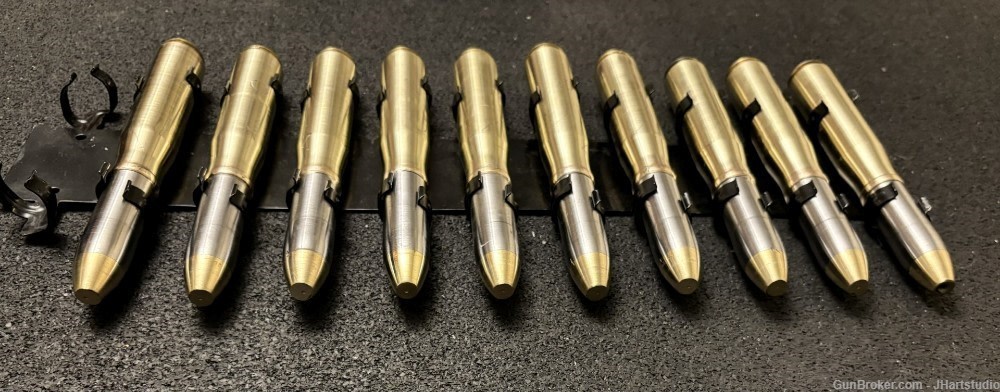 20mm Oerlikon brass case with 20mm steel 11 round clip (ten round clipped) -img-1