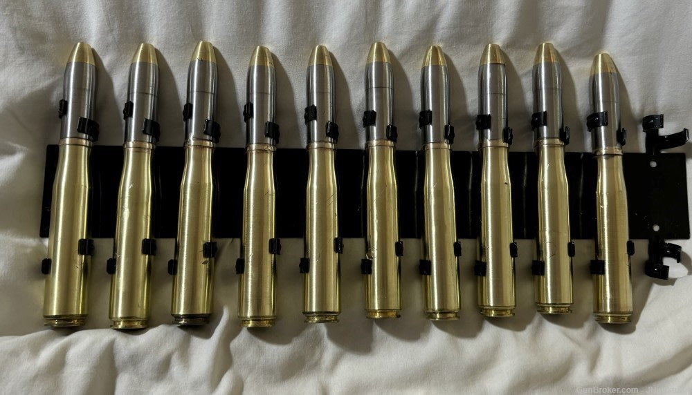 20mm Oerlikon brass case with 20mm steel 11 round clip (ten round clipped) -img-4