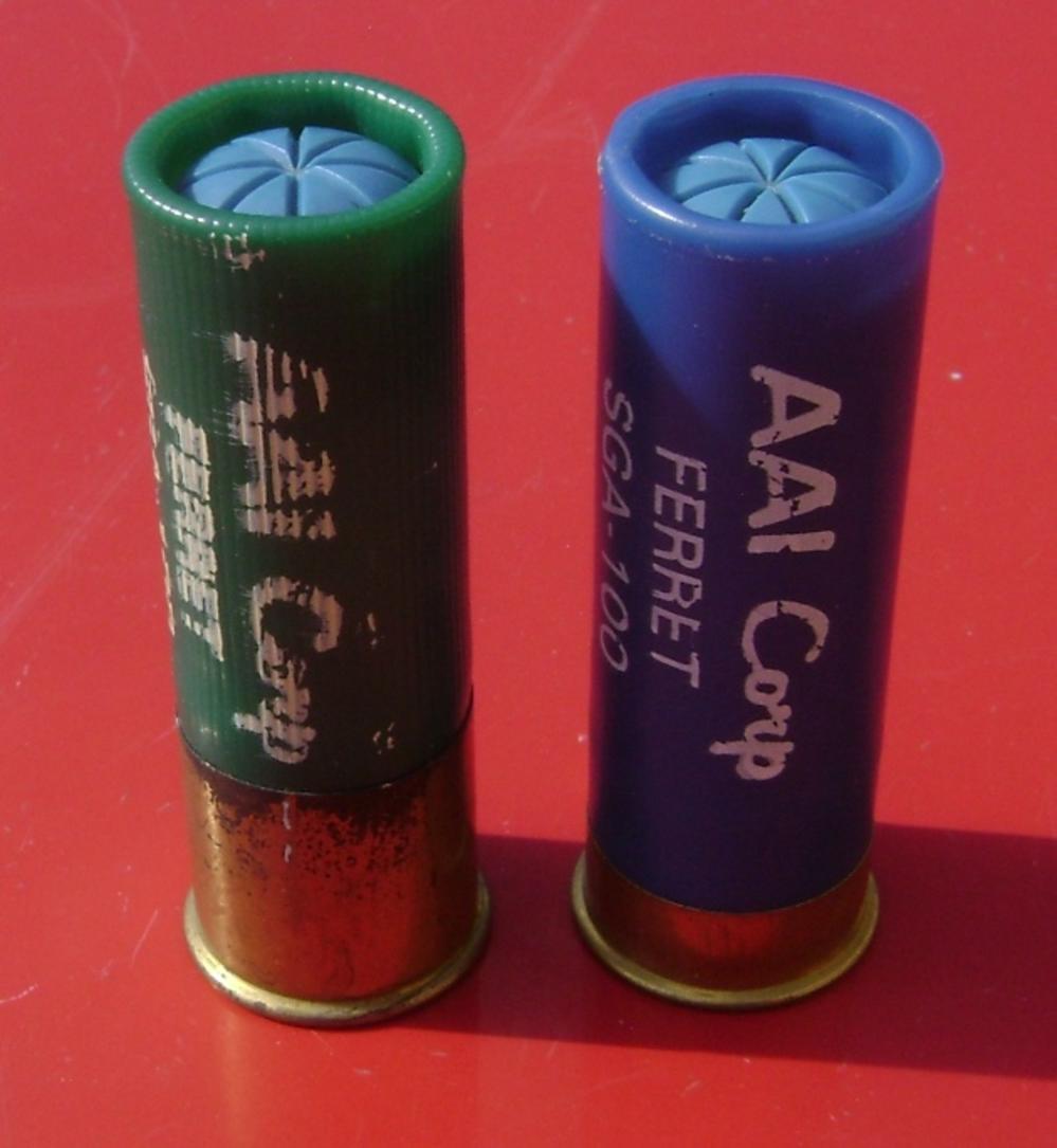 Pair of Live 12ga AAI Corp Barricade Liquid CS-img-0
