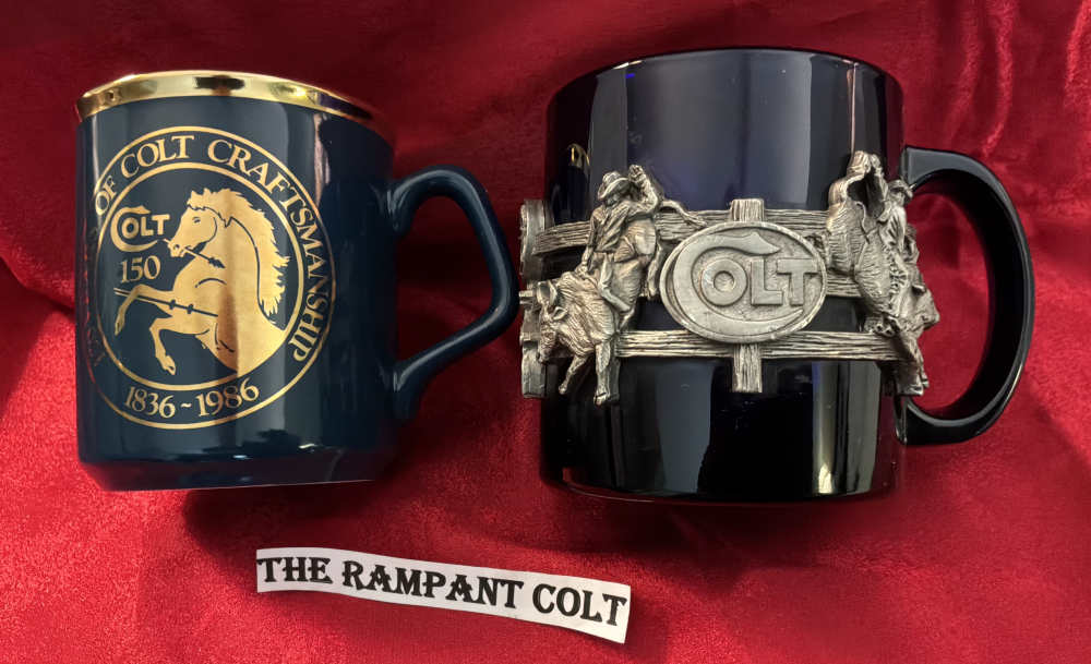 Two Colt Coffee Mugs, Pewter Wrap 1998 Rodeo Mug 150th 1986 Blue Gold Plate-img-0