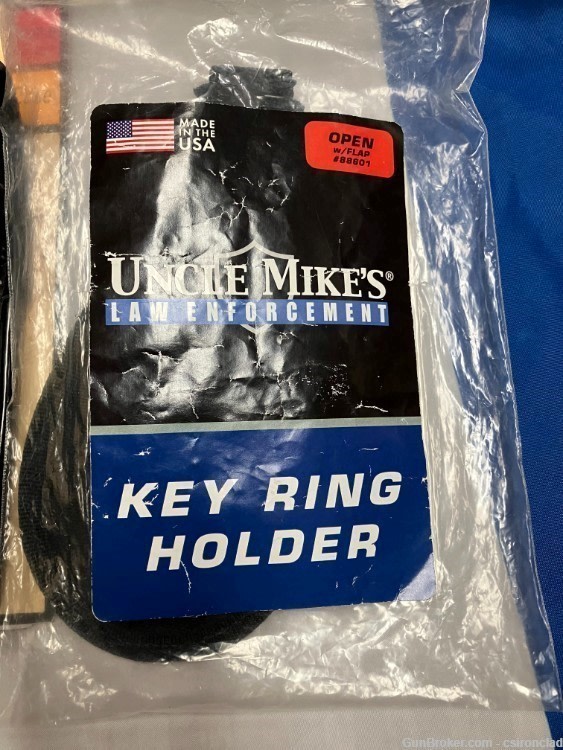 Uncle Mike's Security gear, 3 items, holster, flash holder, key ring. olnew-img-1