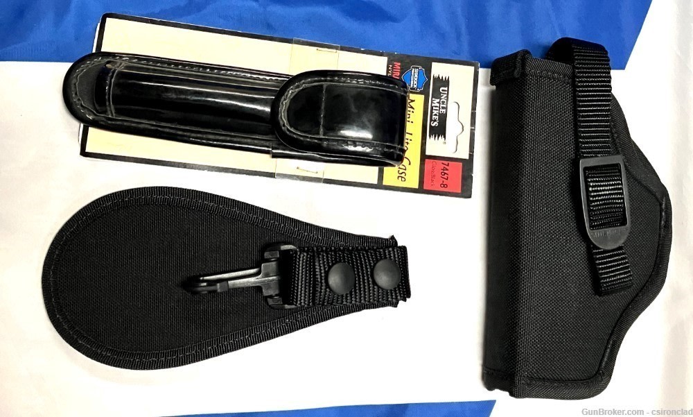 Uncle Mike's Security gear, 3 items, holster, flash holder, key ring. olnew-img-6