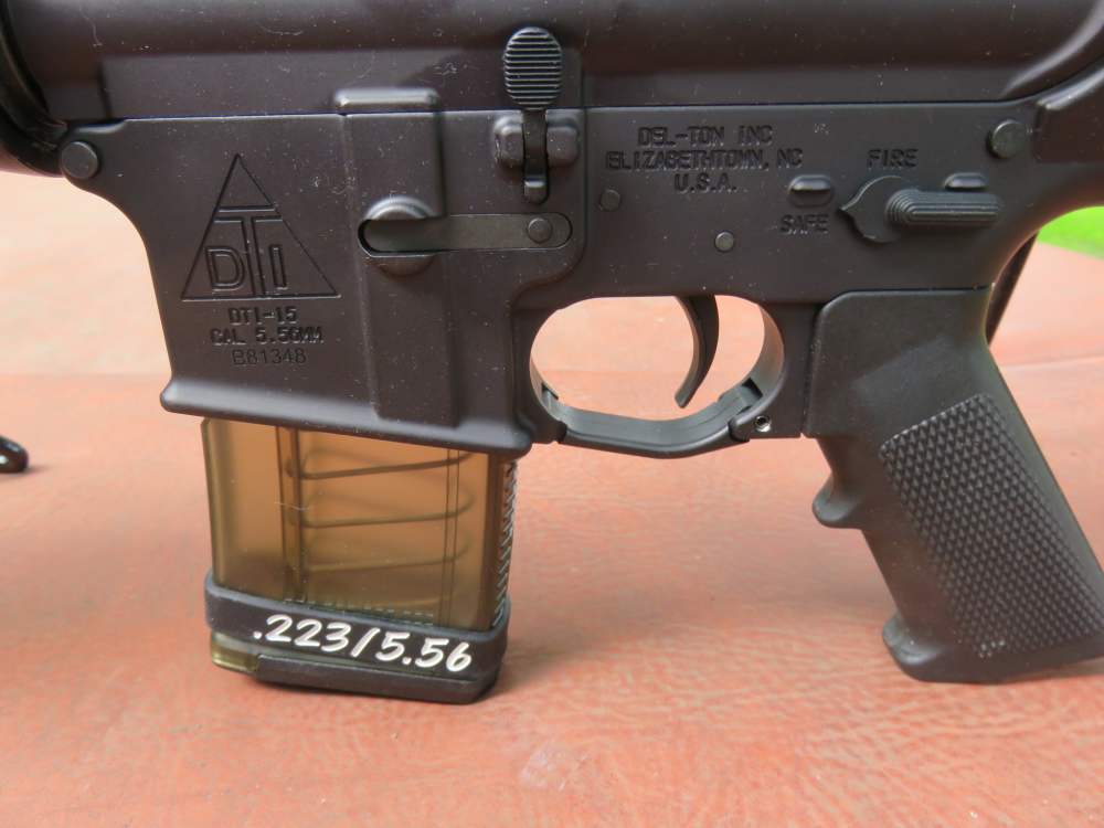 DTI-15 Sport 556/223 18" 2.5-10x40 Scope + Red Laser + Brake As New.-img-12