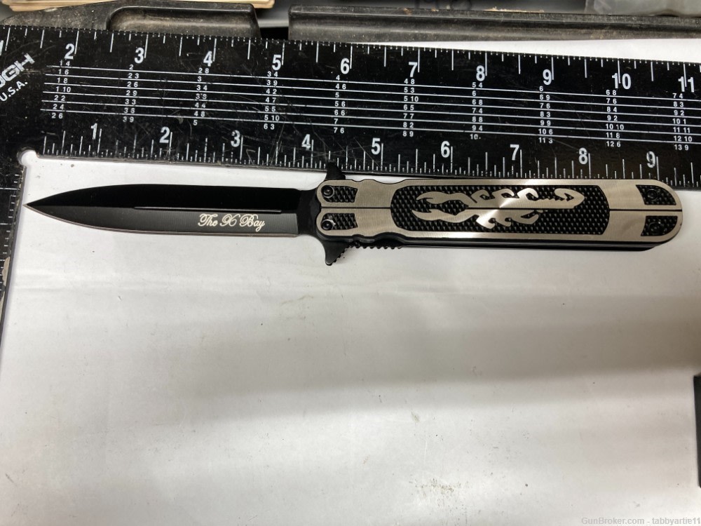 the 96 bay assisted side open stiletto knife new in box -img-1