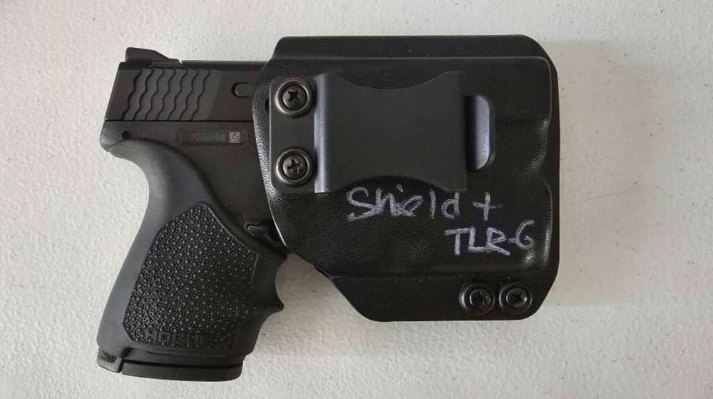 Smith & Wesson M&P Shield Plus 9mm 10+1 Manual Safety TLR-6 CCW Package -img-1