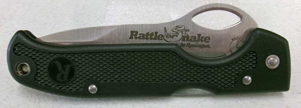 Vintage NEW Remington Rattlesnake knife. Half serrated and half blade.-img-1