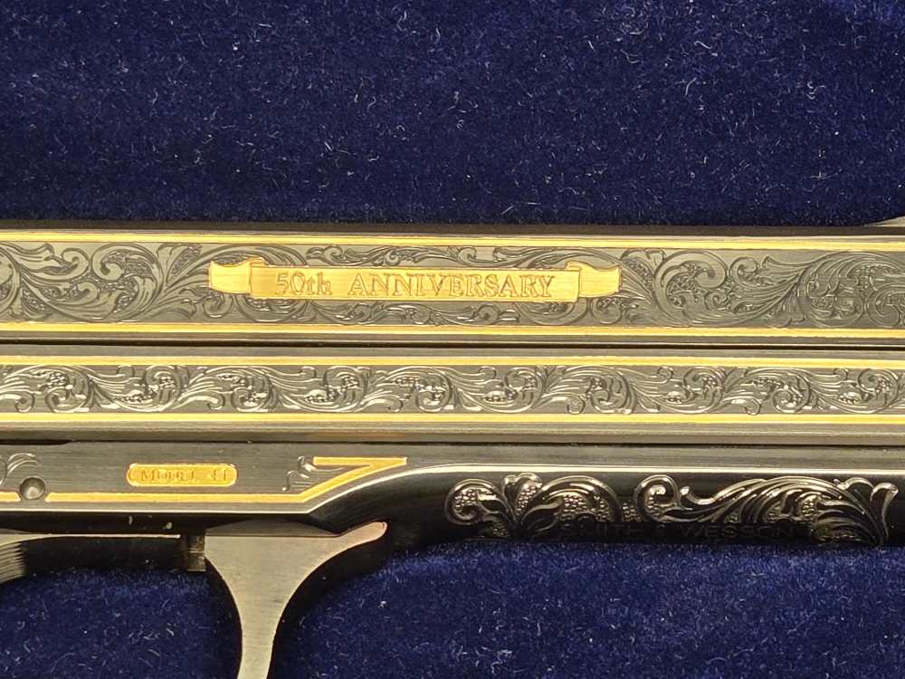 Smith and Wesson 41 50th anniversary S&W  22lr 22 lr 5.5" NOS cased -img-11