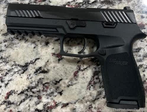 Sig Sauer P320 with Night Sights 9mm-img-1