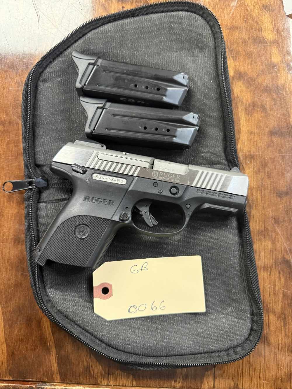 Preowned Ruger SR9c 9mm 2-tone pistol with (2) magazines -img-1