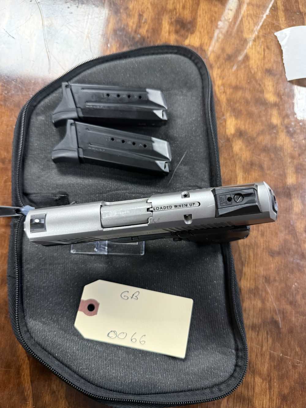 Preowned Ruger SR9c 9mm 2-tone pistol with (2) magazines -img-3