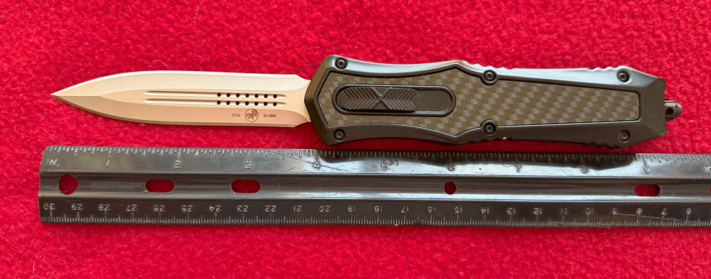 OTF Automatic Knife Scarab  with a 4" Double Edge SS Blade.-img-0