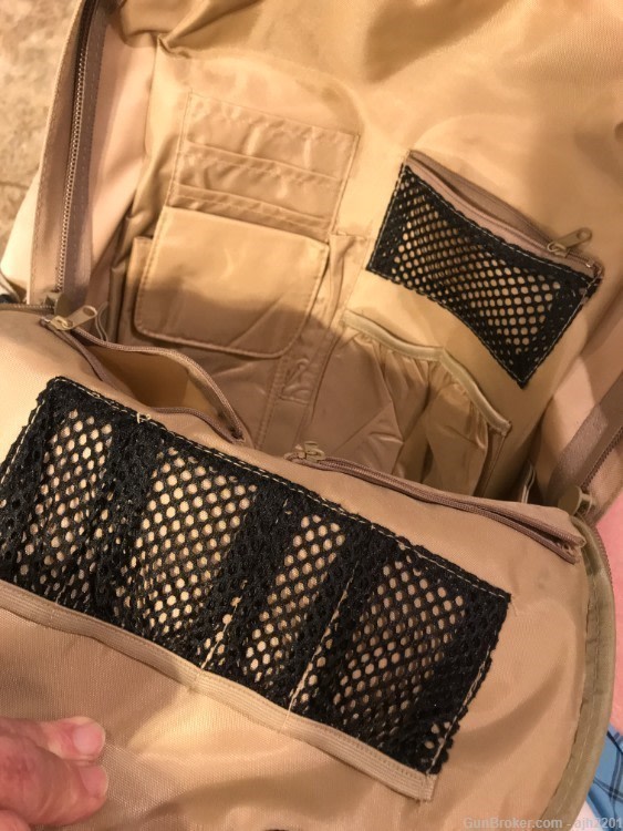 Military style pack by BUG OUT GEAR in desert tan, lots of pockets, adjust-img-1