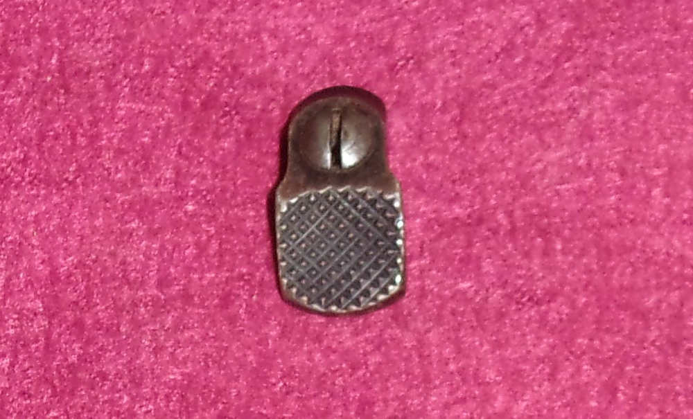 S&W 49 JFRAME 38 SPECIAL THUMBPIECE & NUT ASSEMBLY-img-1