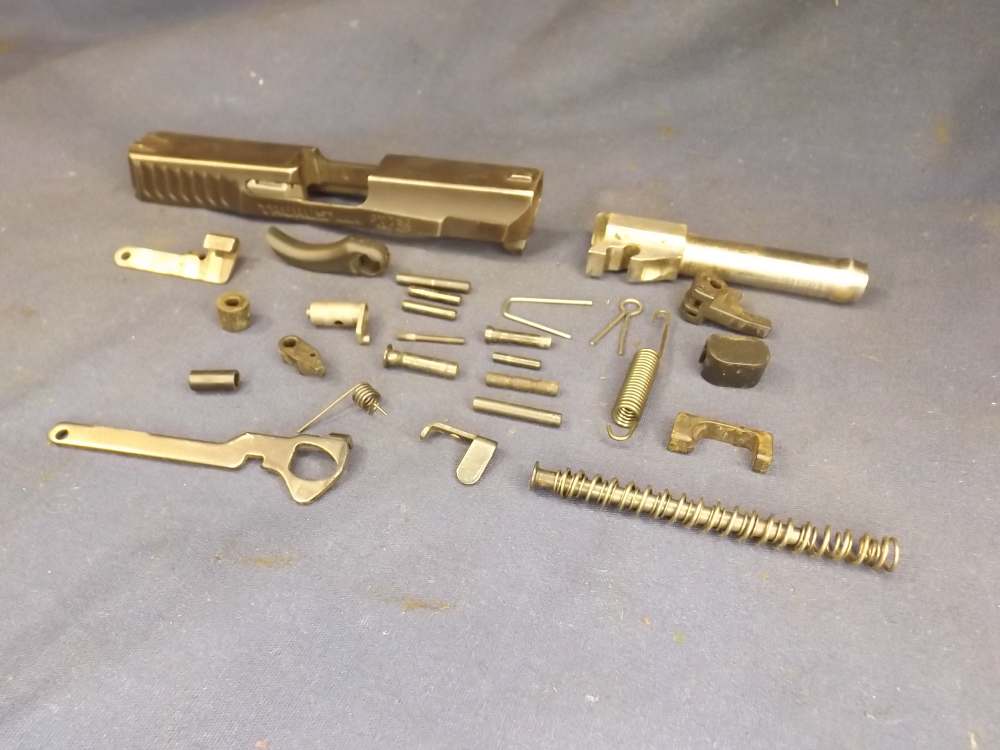 Taurus PT738, .380 ACP Semi-Auto Slide Assy. and Assorted Small Parts-img-1
