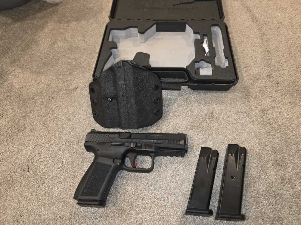 Canik  TP9SF Elite. 9mm. Used. box and holster.3 magazines.-img-0