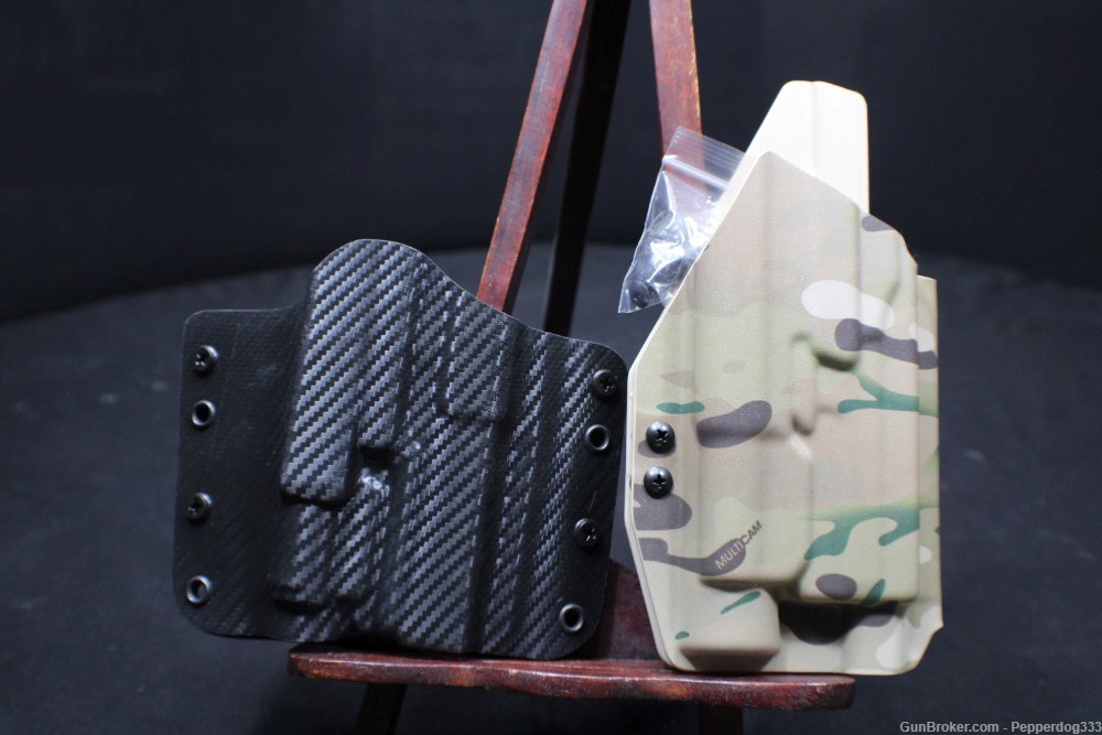 Two New Holsters a Outlaw Holster & a Level 2 Duty Holster Both in New Cond-img-0