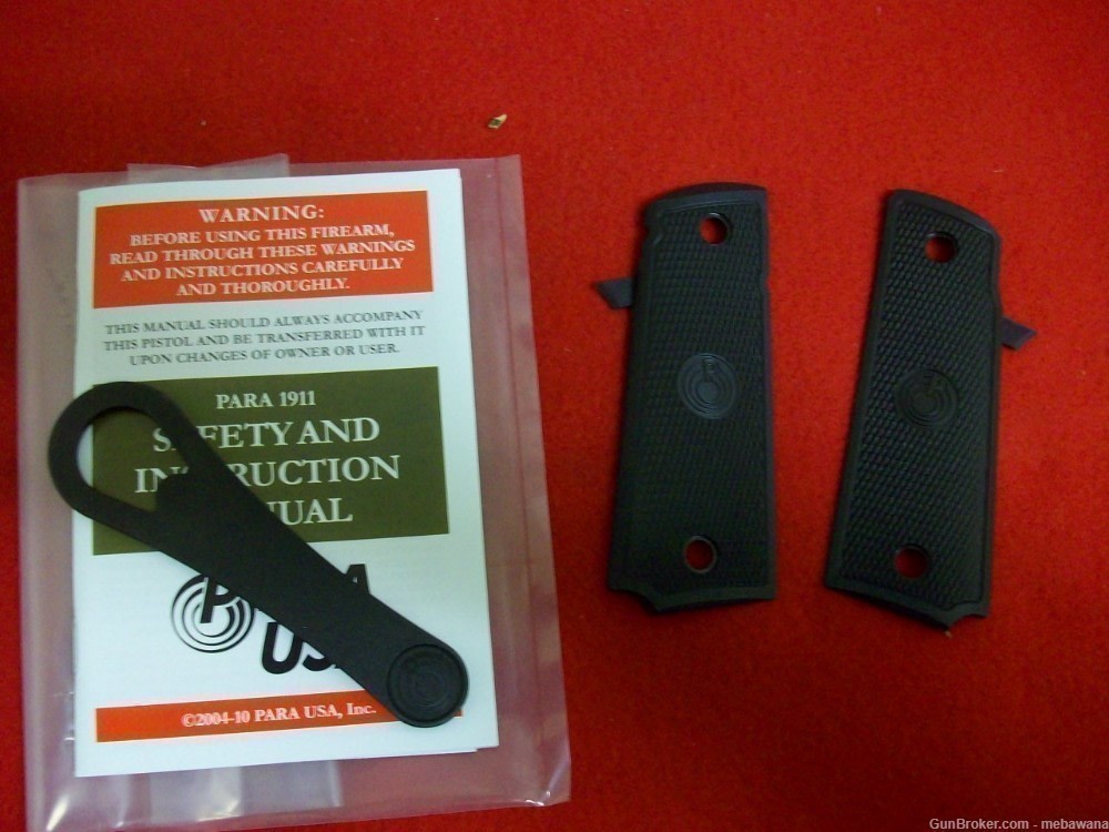Lowered price, New Para Ordnance Factory Grips with Manual and Bushing tool-img-0