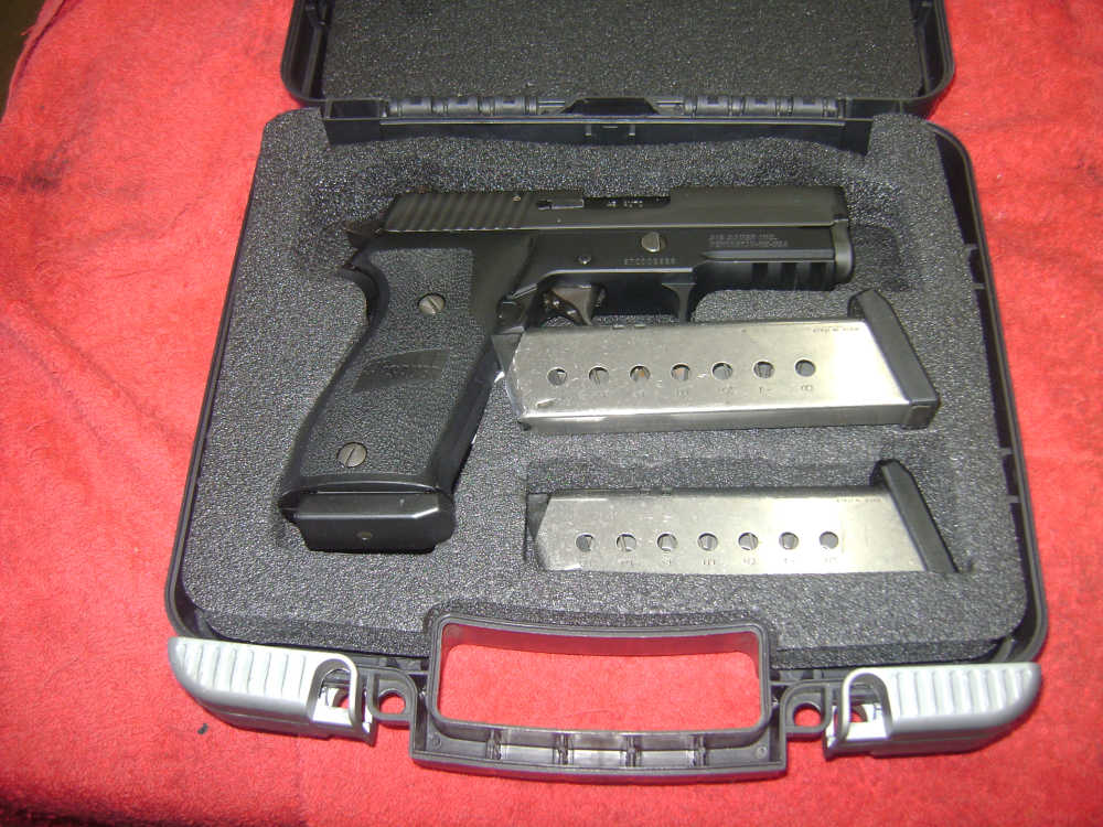 SIG SAUER P 220 -45acp 3-8rd magazines lightly used-img-0