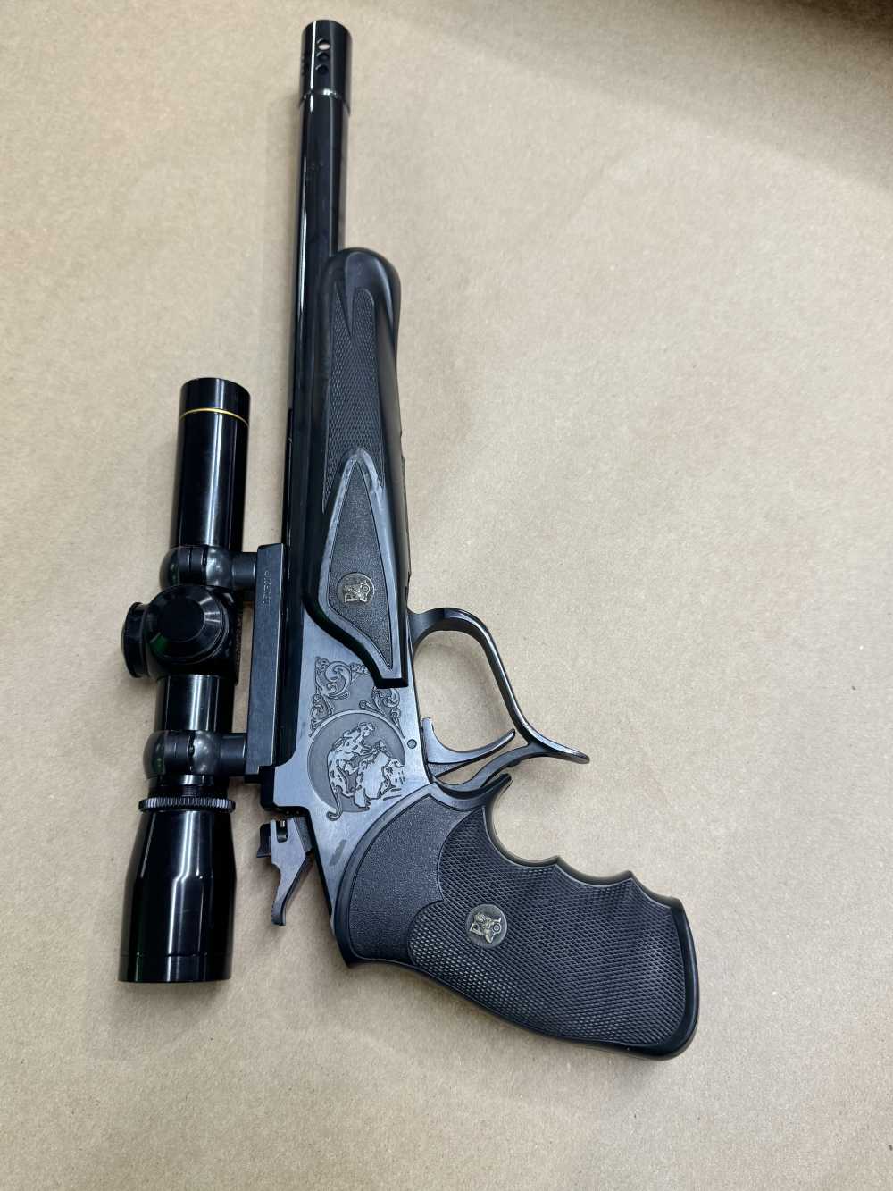 Thompson Center 35 REM Single shot pistol LEUPOLD M8-2X EXTENDED ER SCOPE -img-0