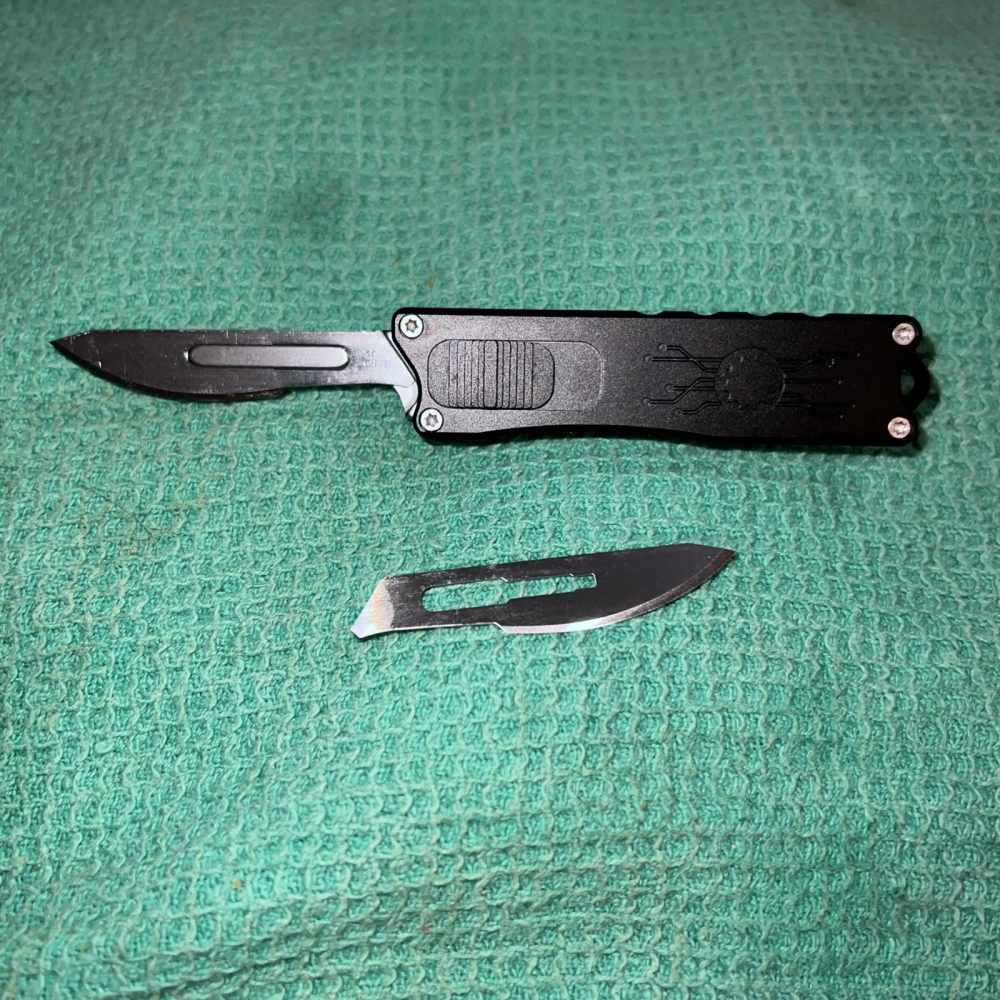 Automatic out the front razor knife-img-0