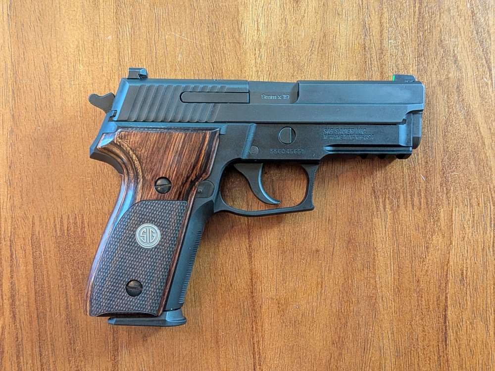 Sig Sauer P229 9mm – Factory Walnut Grips – Barely Fired-img-11