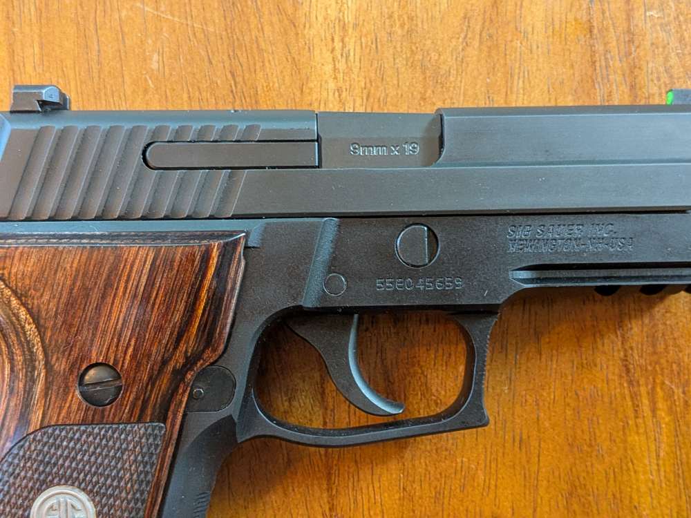 Sig Sauer P229 9mm – Factory Walnut Grips – Barely Fired-img-15