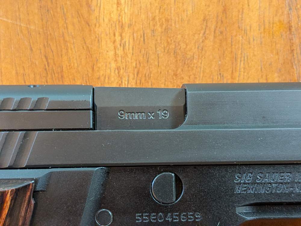 Sig Sauer P229 9mm – Factory Walnut Grips – Barely Fired-img-17