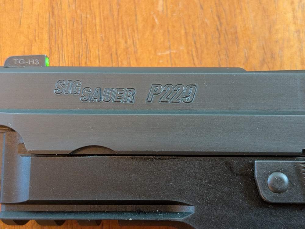 Sig Sauer P229 9mm – Factory Walnut Grips – Barely Fired-img-10