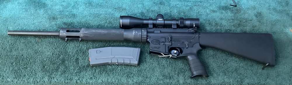 Pre-owned Mossberg MMR Hunter rifle w/ scope, mag in 5.56 mm -img-0