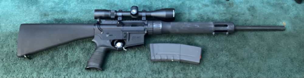 Pre-owned Mossberg MMR Hunter rifle w/ scope, mag in 5.56 mm -img-1