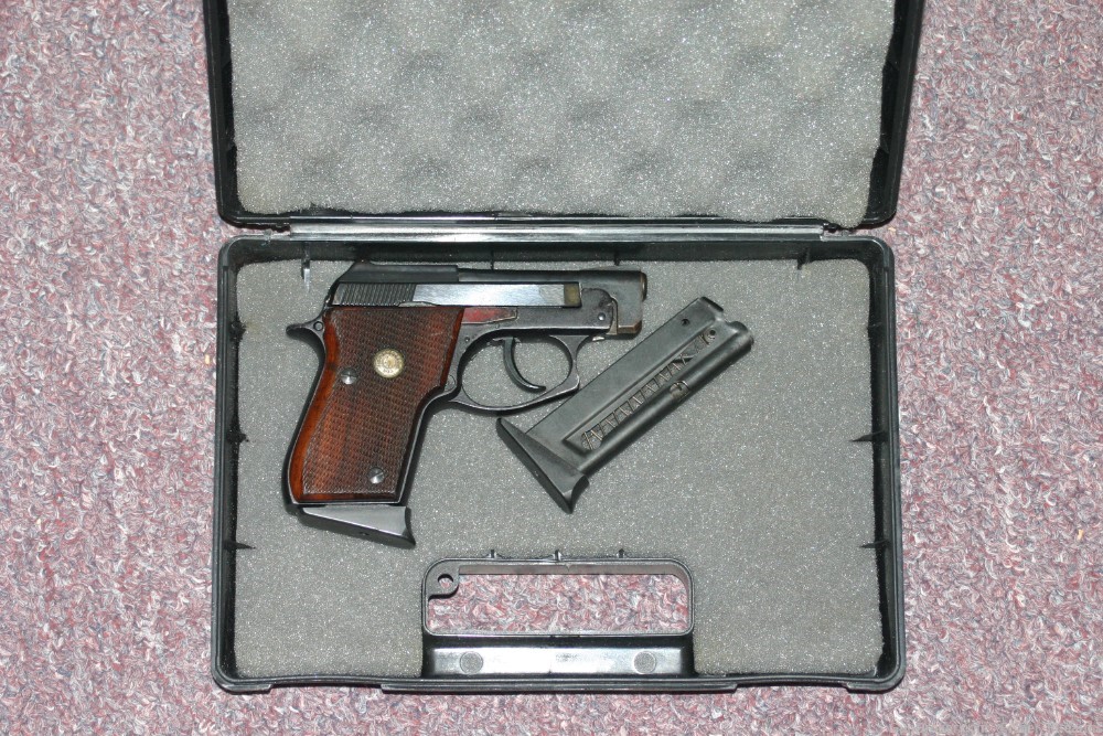 Taurus PT-22 .22 LR  with two magazines and a case  Good Condition-img-0