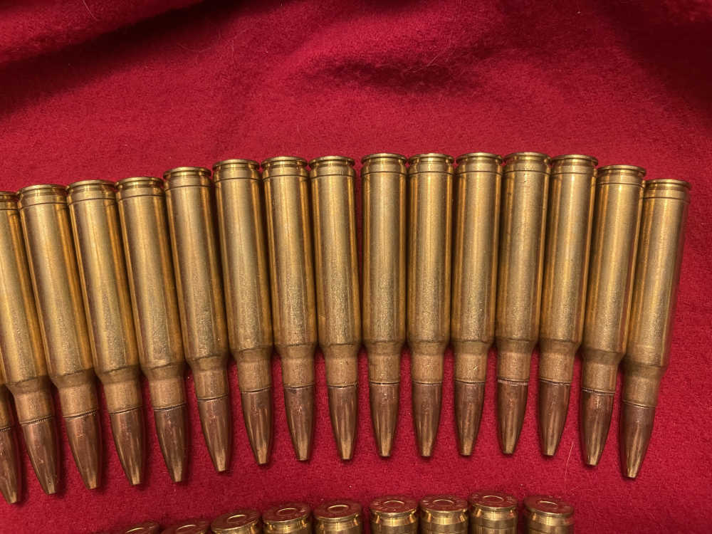 338 Win Mag ammo — Partial lot of 34 rounds-img-13
