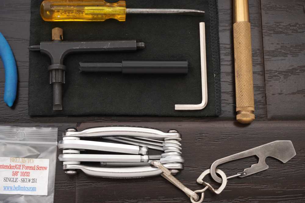 Lot of Thompson Center Tools, Scope Rings, Leather Case and Forend Screws-img-3