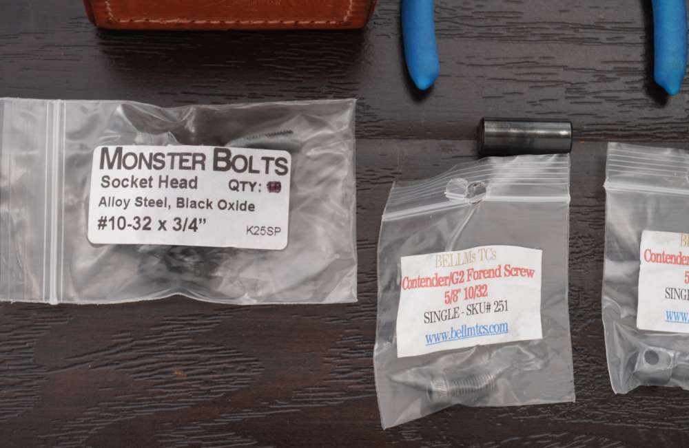 Lot of Thompson Center Tools, Scope Rings, Leather Case and Forend Screws-img-1