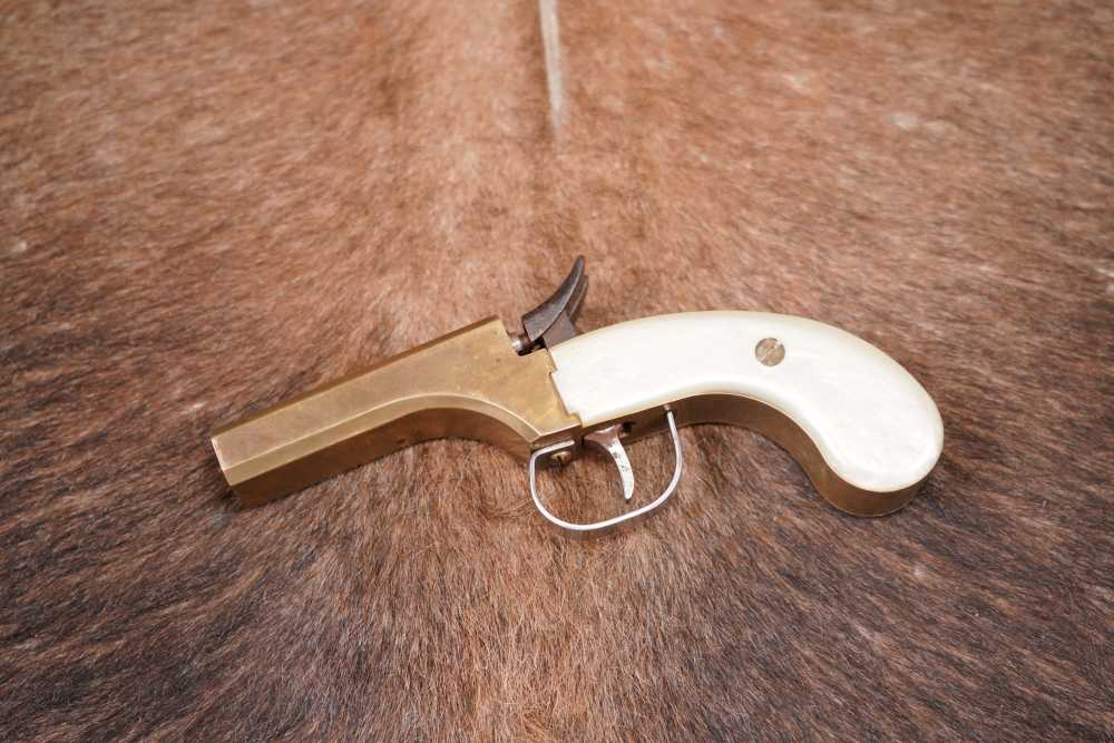 CMC Snake Eyes .36 Caliber 3” Brass Double Barrel Percussion Derringer-img-1