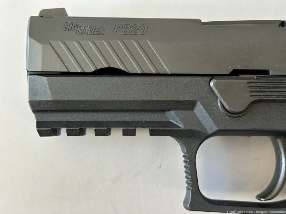 Sig Sauer P320 Compact 9mm 3.9-Inch 15+1 Extra Mag NEVER FIRED-img-2