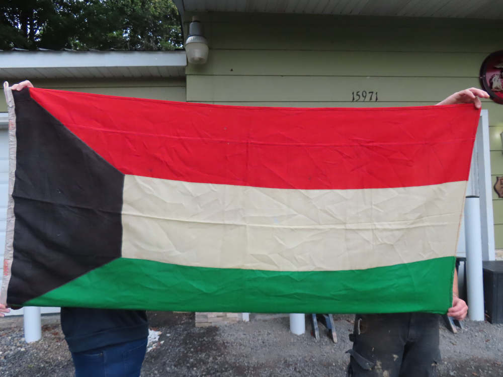 VINTAGE FLAG OF KUWAIT DATED 1978 ON THE HOIST END WITH OTHER WRITTING-img-0